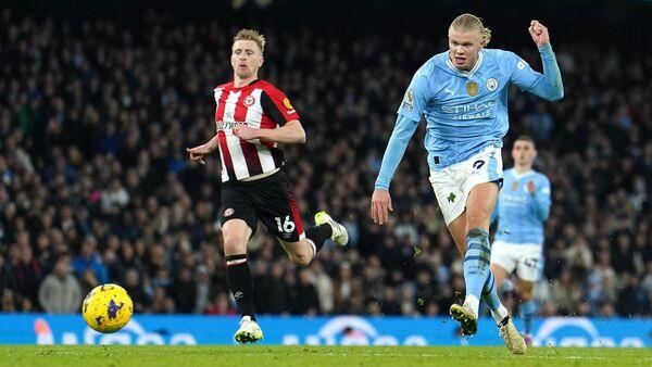 Erling Haaland pounces on defensive error to send Manchester City second